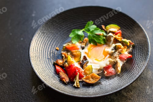 Preview: Fried Eggs With Vegetables Omelet Ready To Cook And Eat On The Table For Healthy Meal Snack Outdoor