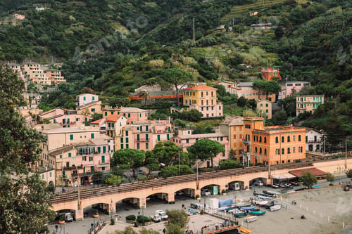 Preview: Cityscape of Monterosso al Mare with picturesque green hills on the background, Five lands, Italy
