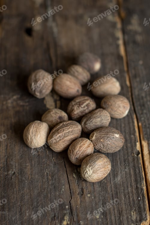 Preview: Nutmeg - Spices - On A Wooden Background