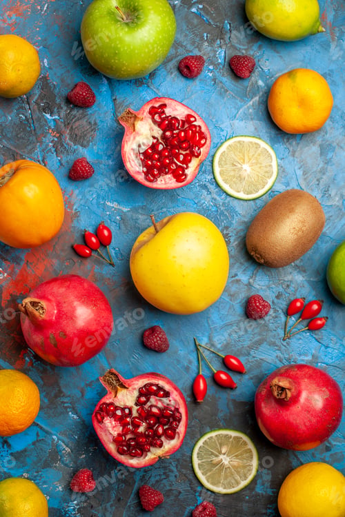Preview: top view fresh fruits lined on blue background health diet photo ripe tasty mellow
