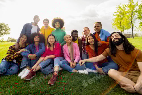 Preview: multicultural and diverse friends looking at camera for lasting friendship team photo