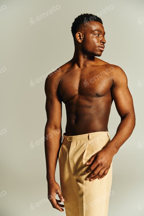Preview: Young african american man showcasing confidence and style in a creative pose