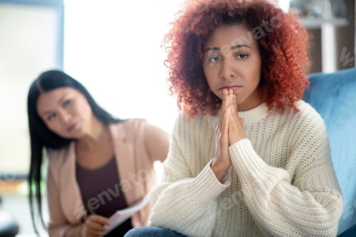 Preview: Woman feeling depressed while coming to psychoanalyst