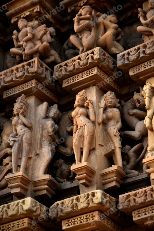 Preview: Stone carving bas relief sculptures on Khajuraho Temple, India.
