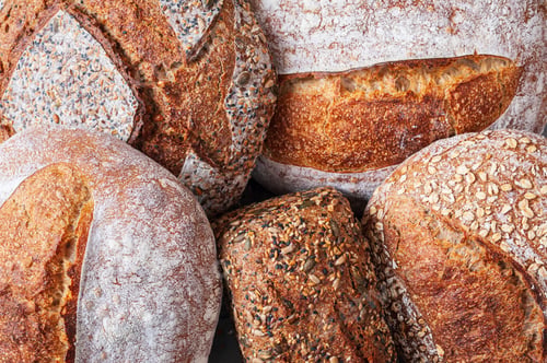 Preview: Selection of freshly baked organic sourdough loafs of bread.