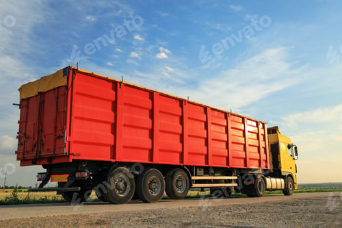 Preview: Modern bright truck parked on country road