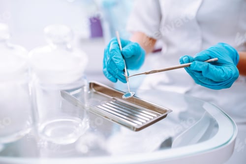 Preview: A set of sterile dental instruments for dental treatment. Dental care for people.