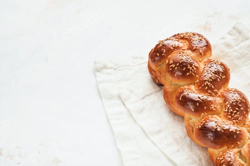 Preview: Challah bread. Sabbath kiddush ceremony composition. Freshly baked homemade braided challah bread fo