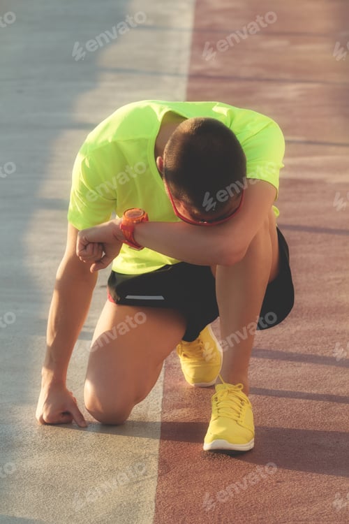Preview: Tired Urban Jogger Making A Pause After Forcing His Body On A Big Bridge.