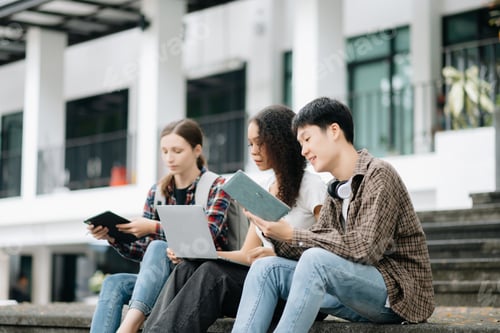 Preview: Students are studying the campus park. Young people are spending time together. Reading book working