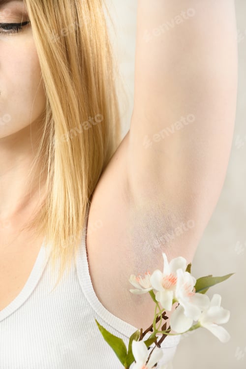 Preview: Woman showing armpit after electro epilation.