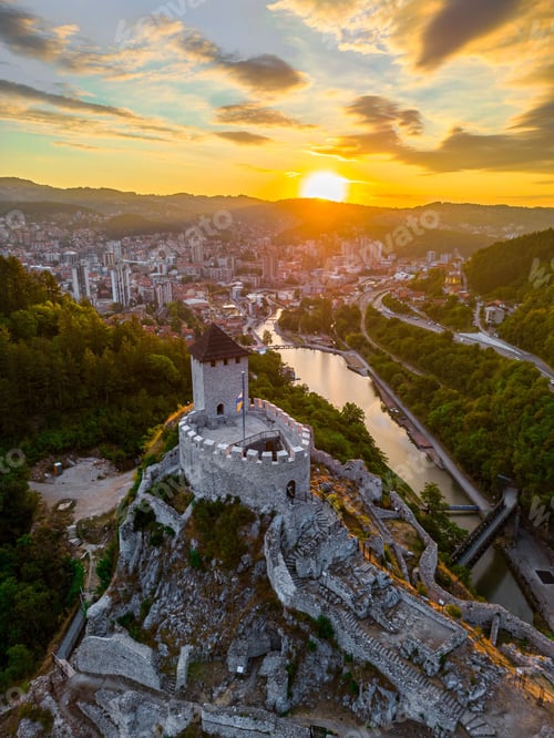 Preview: Aerial vertical of the city of Uzice in Zlatibor, Serbia during sunset