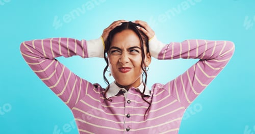 Preview: Woman, mistake and frustrated in studio with hands on head for worry, doubt and brain fog by blue b