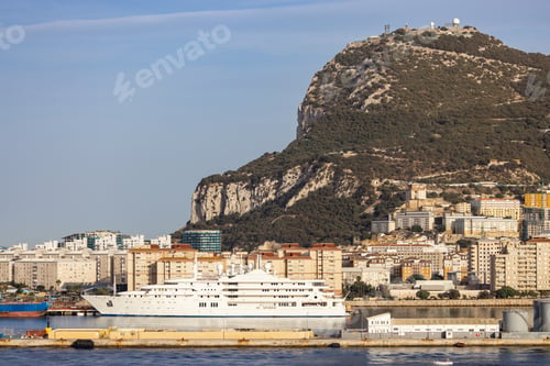 Preview: City Buildings, Port and Mountain by the Sea. Sunny Sky. Gibraltar, United Kingdom
