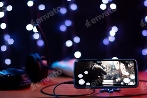 Preview: Close-up of a mobile first-person shooter game. Smartphone player configuration.