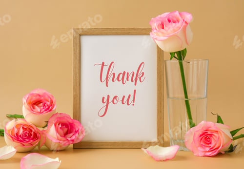 Preview: Mockup Wooden frame with text THANK YOU on delicate pink roses on beige background. Minimal trendy
