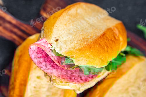 Preview: sandwich bun, sausage, salami, arugula, green lettuce cooking appetizer meal food snack on the table