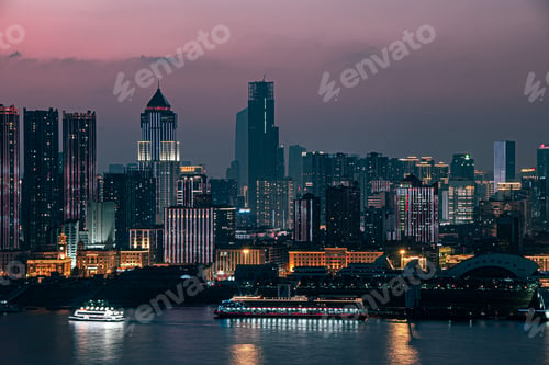 Preview: By the Yangtze River, under the sunset, skyscrapers in Wuhan are illuminated