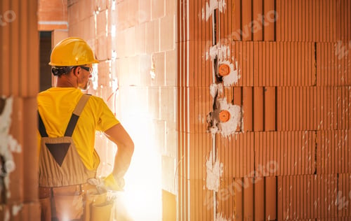 Preview: Construction Worker Inside Newly Built Concrete Blocks Building