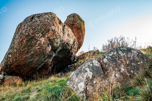 Preview: Huge deposits of stone minerals in a clearing bathed in warm sun in picturesque Ukraine