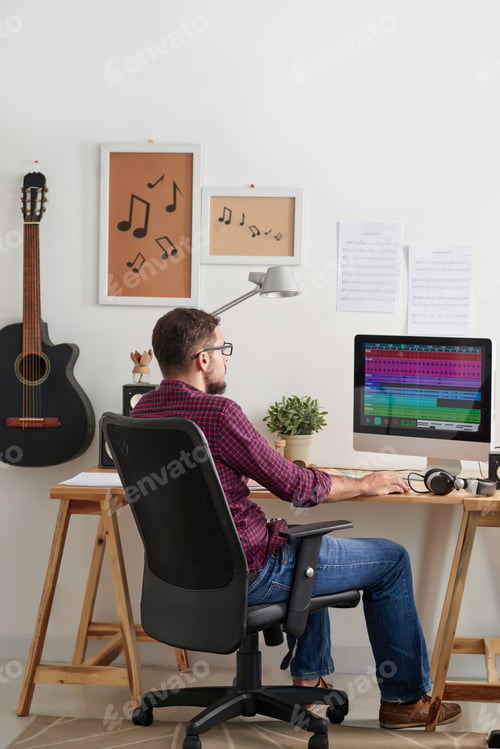 Preview: Man working at recording studio