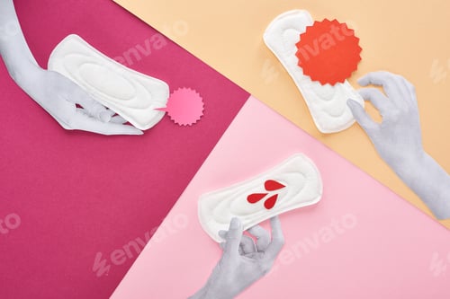 Preview: top view of paper cut white hands with white sanitary napkins near empty cards and blood drops on
