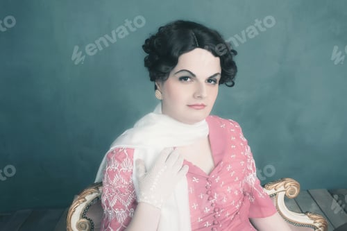 Preview: Transgender Woman Vintage 1920S Fashion Sitting On Sofa.