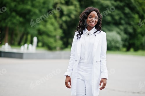 Preview: Stylish and beautiful black african american girl background fountain at city