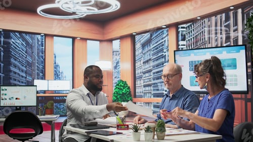 Preview: Elderly people discussing with financial expert about suitable retirement plans