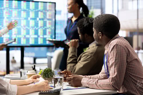 Preview: The CEO and management team gathering in boardroom for a project briefing