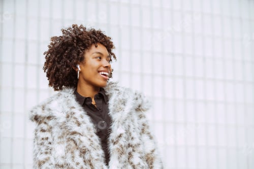 Preview: Stylish Woman in Fur Coat Smiling Outdoors