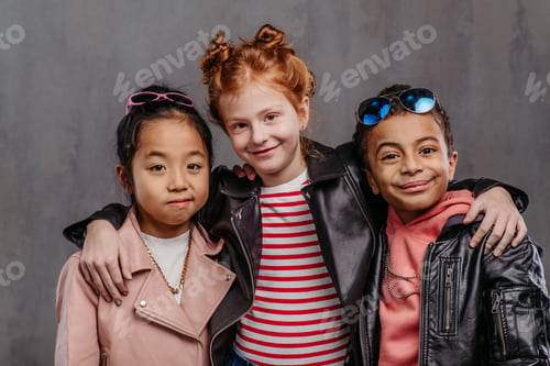 Preview: Portrait of three children with leather jacket.