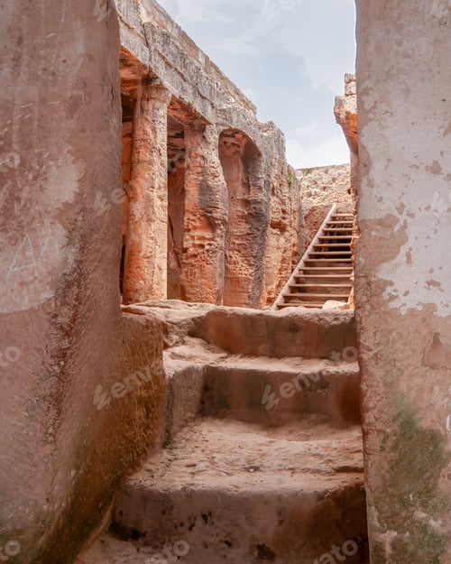 Preview: Ancient stone staircase to ruins under cloudy sky