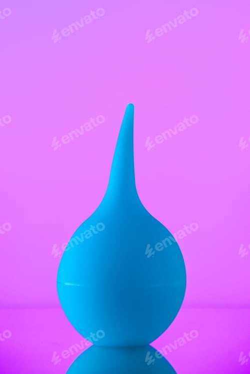 Preview: front view rubber bulb syringe on pink background