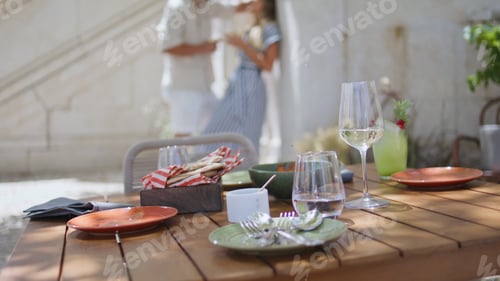 Preview: Couple silhouettes flirting summer cafe dinner. Romantic pair holding glasses