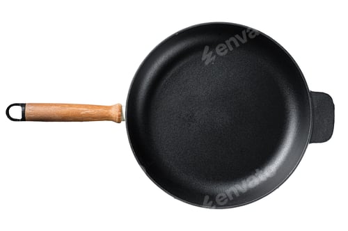 Preview: Empty cast-iron skillet for cooking on rustic towel. Isolated, white background.