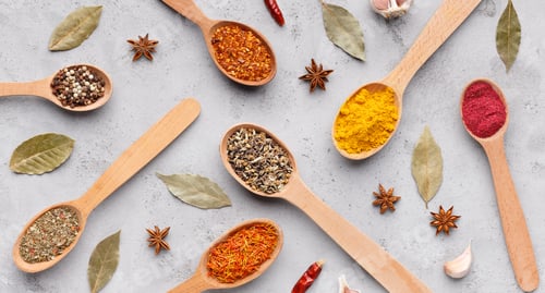 Preview: Spices and herbs on grey background, top view