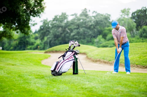 Preview: Golfer practicing and concentrating before and after shot