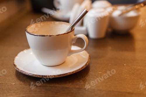 Preview: Cappuccino in a Cup on the table