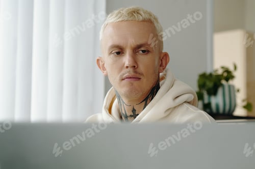 Preview: Young Man Working On Laptop
