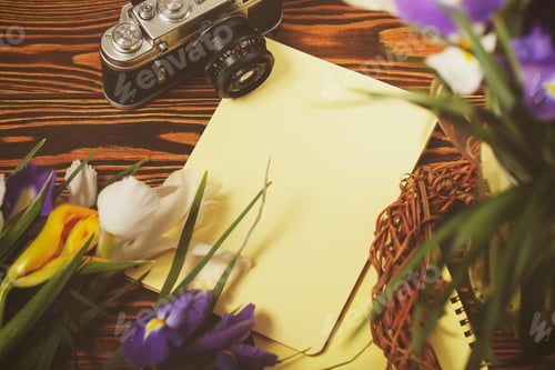 Preview: Notebook For Records And Flowers Lie On Wooden Table