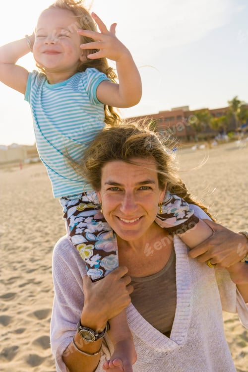 Preview: mother and daughter playing on beach, Cabo San Lucas, Mexico