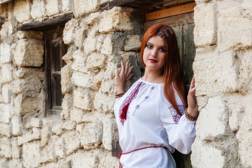 Preview: beautiful girl in Ukrainian embroidered and red skirt