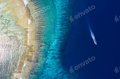 Preview: Fast boat on the sea. Aerial view of luxury floating boat on blue water at sunny day.