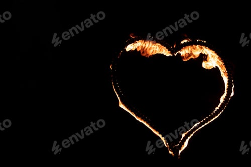 Preview: Burning heart with flames. Isolated on dark background. fire show in night. happy valentine's day