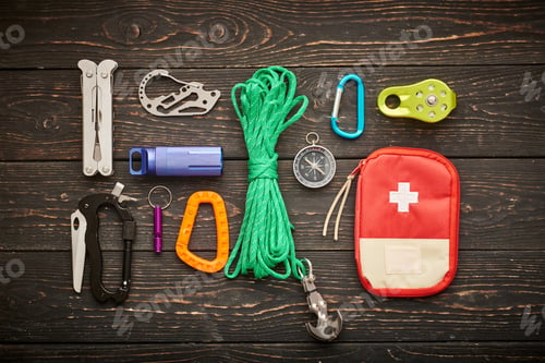 Preview: Travel items for hiking over wooden background