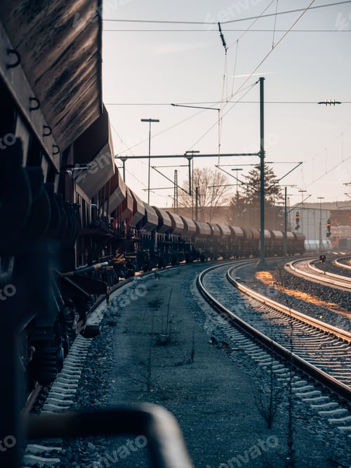 Preview: Cargo train on railways on a sunny day