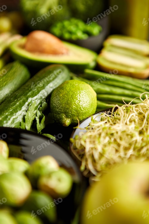 Preview: Green healthy food composition with avocado, broccoli, apple, smoothie