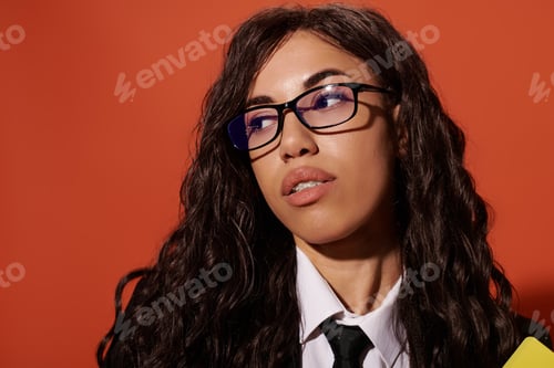 Preview: Young beautiful student exudes confidence with stylish aesthetics against vibrant backdrop