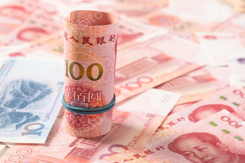 Preview: Roll of Chinese yuan banknotes.